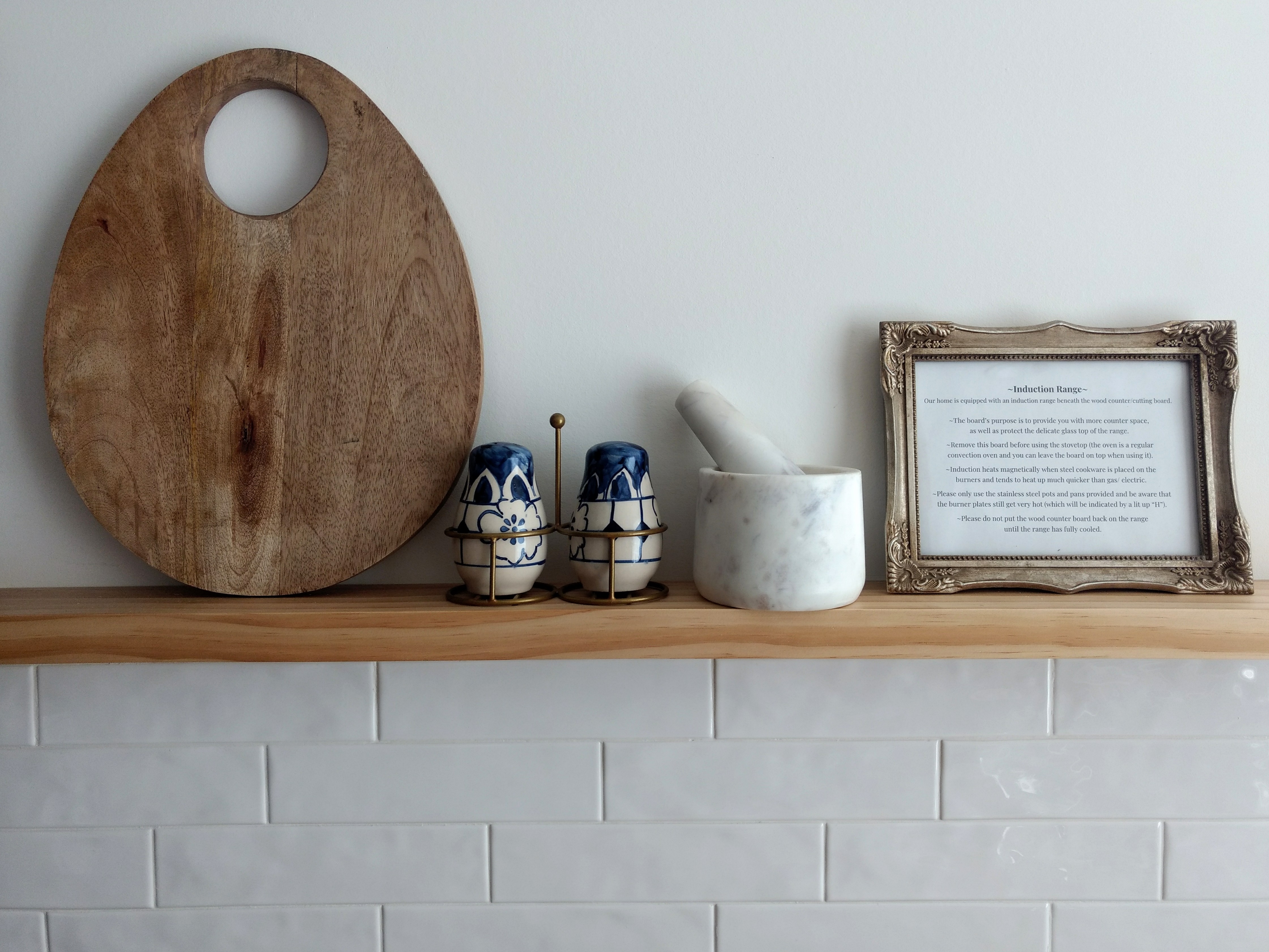 Custom kitchen shelving and tile backsplash 